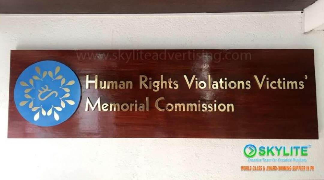 human rights commission brass sign on wood finish 2 1080x600 1
